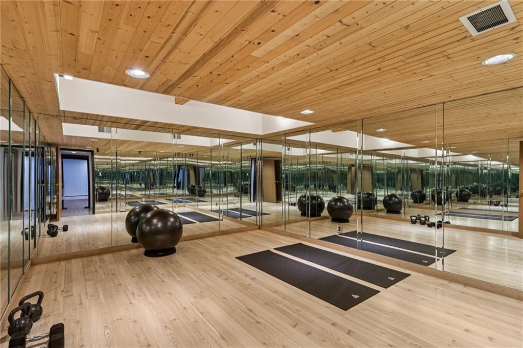 8110 Ridge Road Natrona Heights, PA 15065 - Photo 21 of 50 a view of a patio with table and chairs potted plants with wooden floor