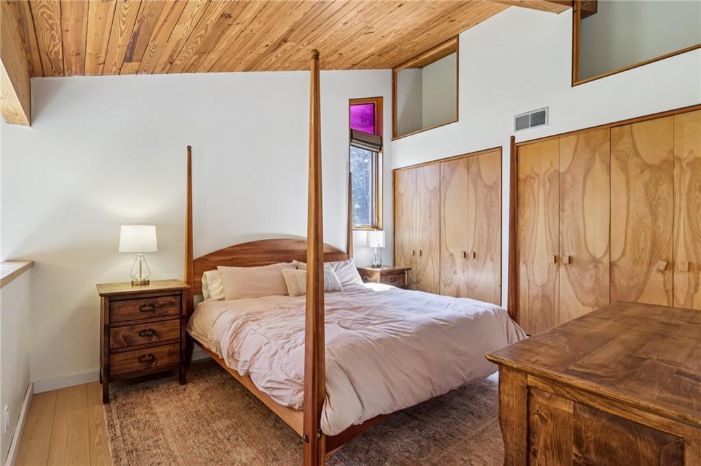 8110 Ridge Road Natrona Heights, PA 15065 - Photo 23 of 50 a bedroom with a bed and a cabinets