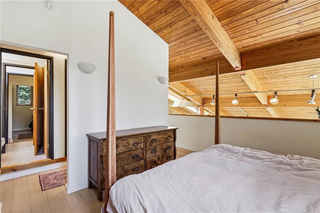 8110 Ridge Road Natrona Heights, PA 15065 - Photo 25 of 50 a bedroom with a bed and a dresser next to a window