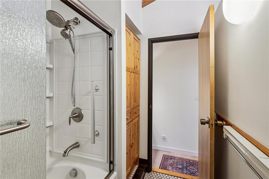 8110 Ridge Road Natrona Heights, PA 15065 - Photo 28 of 50 a bathroom with a bathtub and a shower
