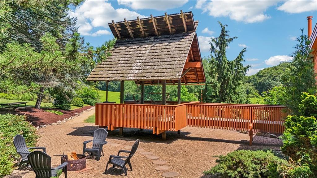 8110 Ridge Road Natrona Heights, PA 15065 - Photo 50 of 50 a view of backyard with outdoor seating and plants