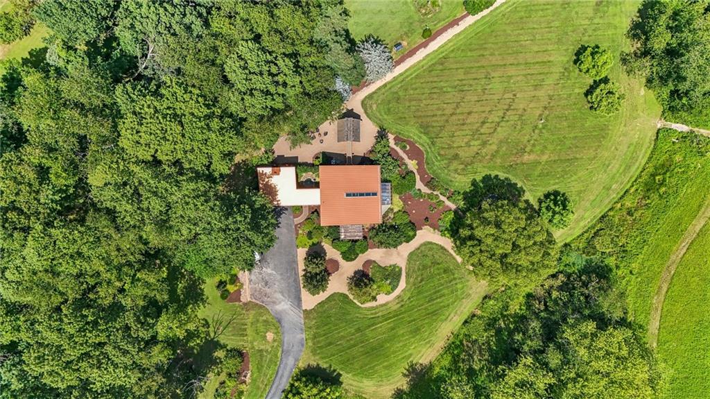 8110 Ridge Road Natrona Heights, PA 15065 - Photo 5 of 50 an aerial view of a house with a yard and swimming pool