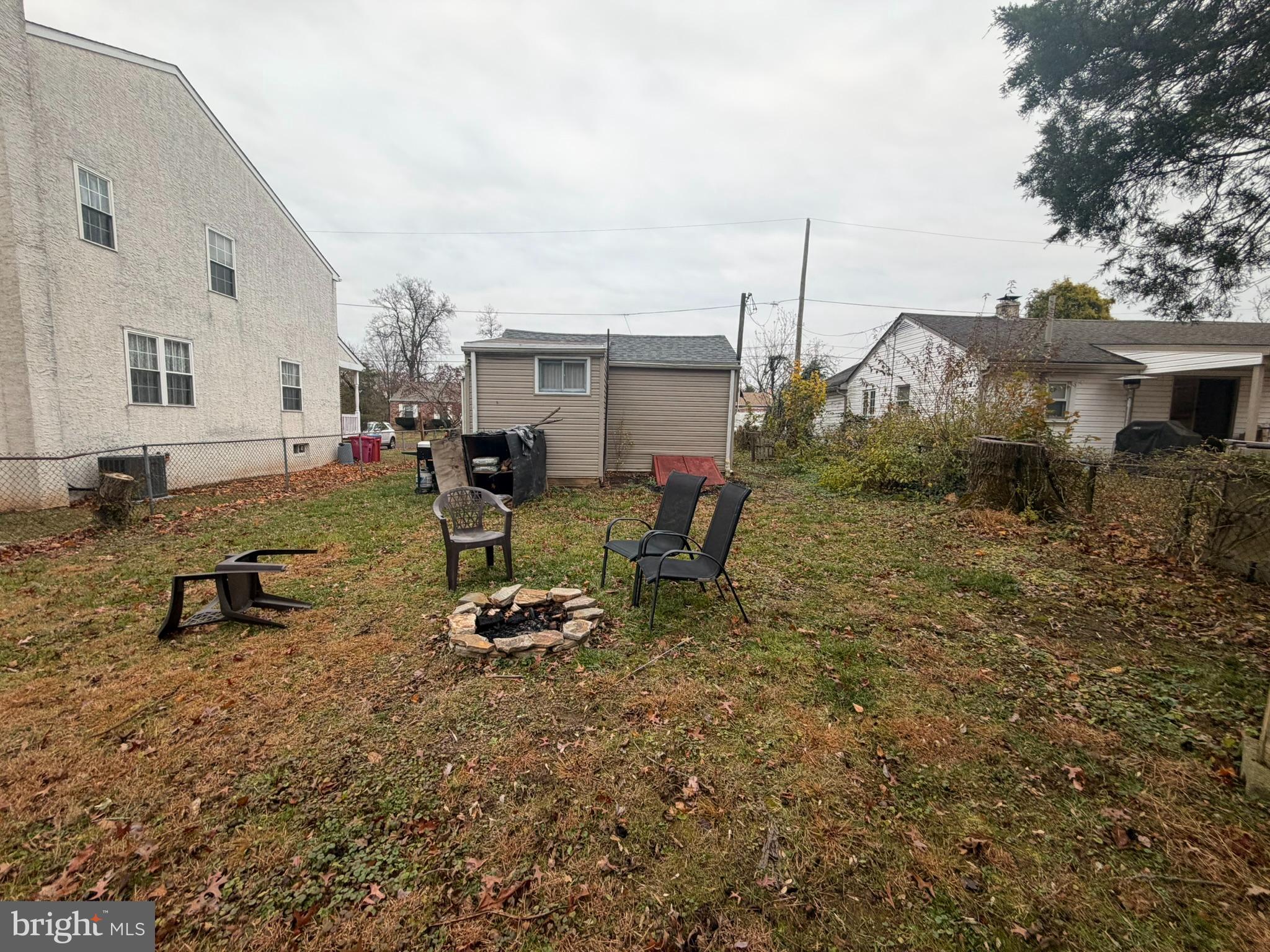 2814 3rd Street Norristown, PA 19403 - Photo 9 of 11 a view of a backyard with chairs and iron fence