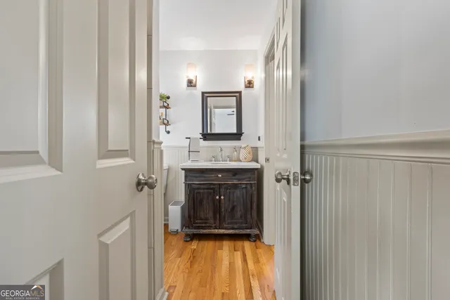 a bedroom with a bed and dresser