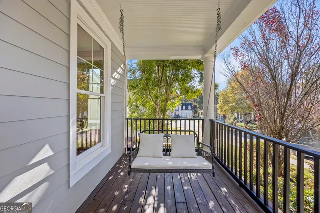 a kitchen with stainless steel appliances a refrigerator sink and cabinets