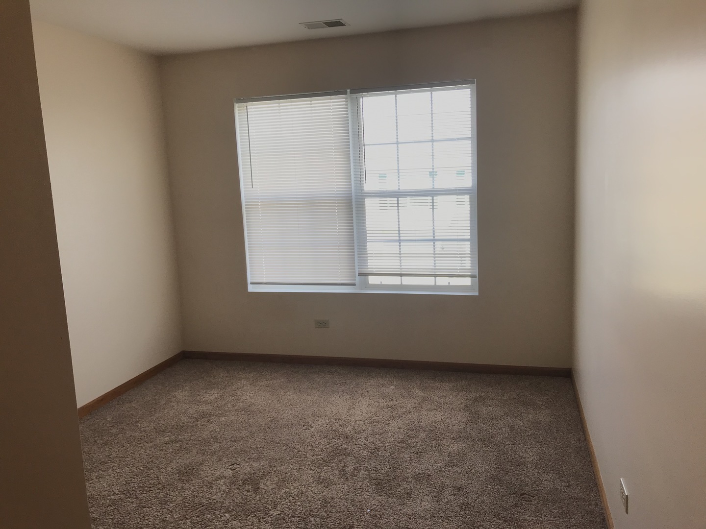 1456 Berta Drive Crest Hill, IL 60403 - Photo 12 of 17 an empty room with a window