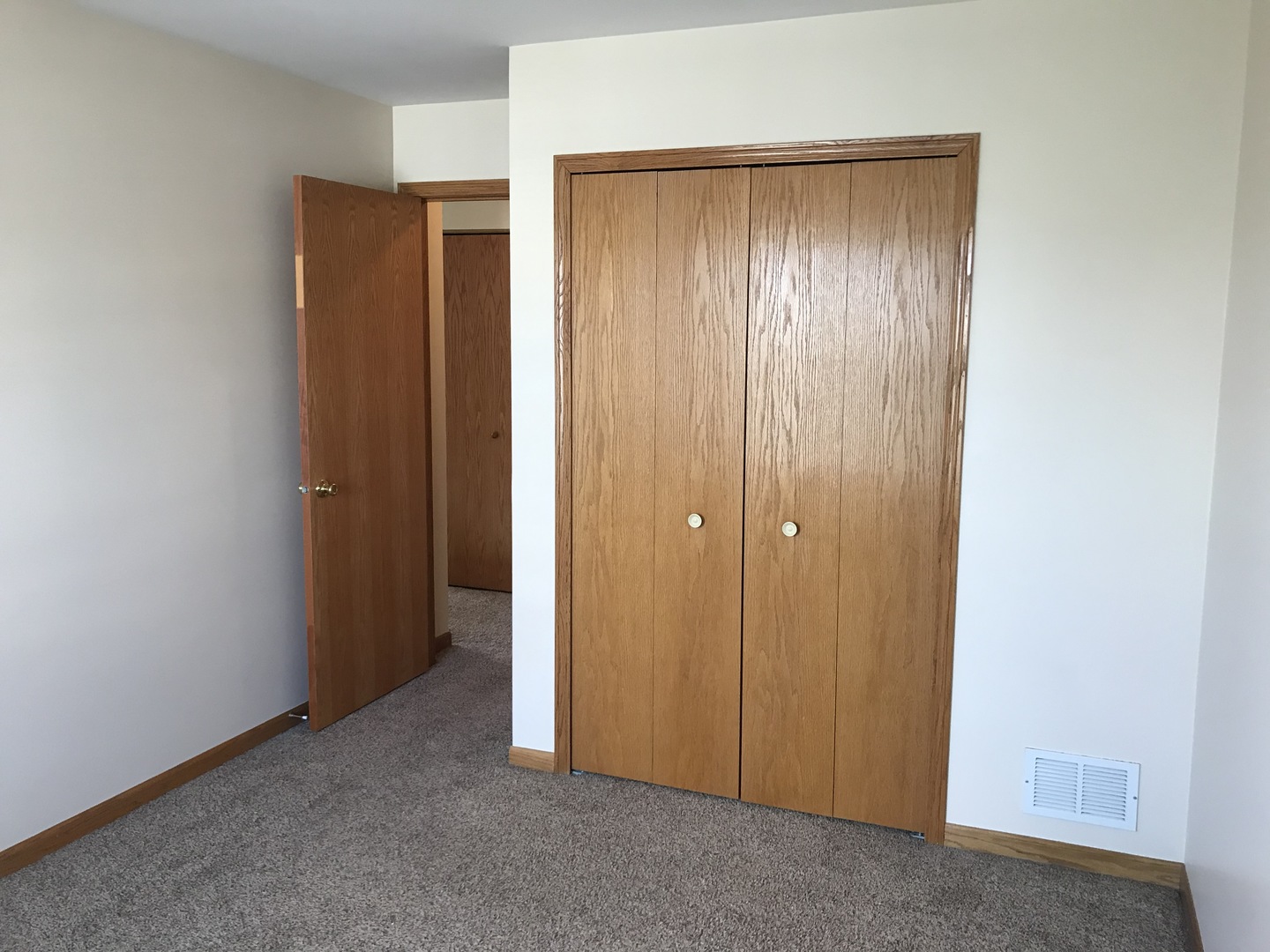 1456 Berta Drive Crest Hill, IL 60403 - Photo 14 of 17 a view of an empty room with closet area