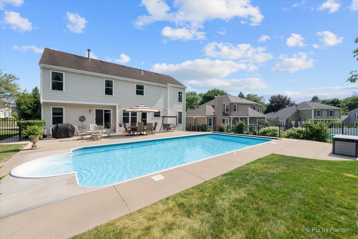 936 Ridgewood Drive Cary, IL 60013 - Photo 36 of 45 a view of house with swimming pool yard and outdoor seating