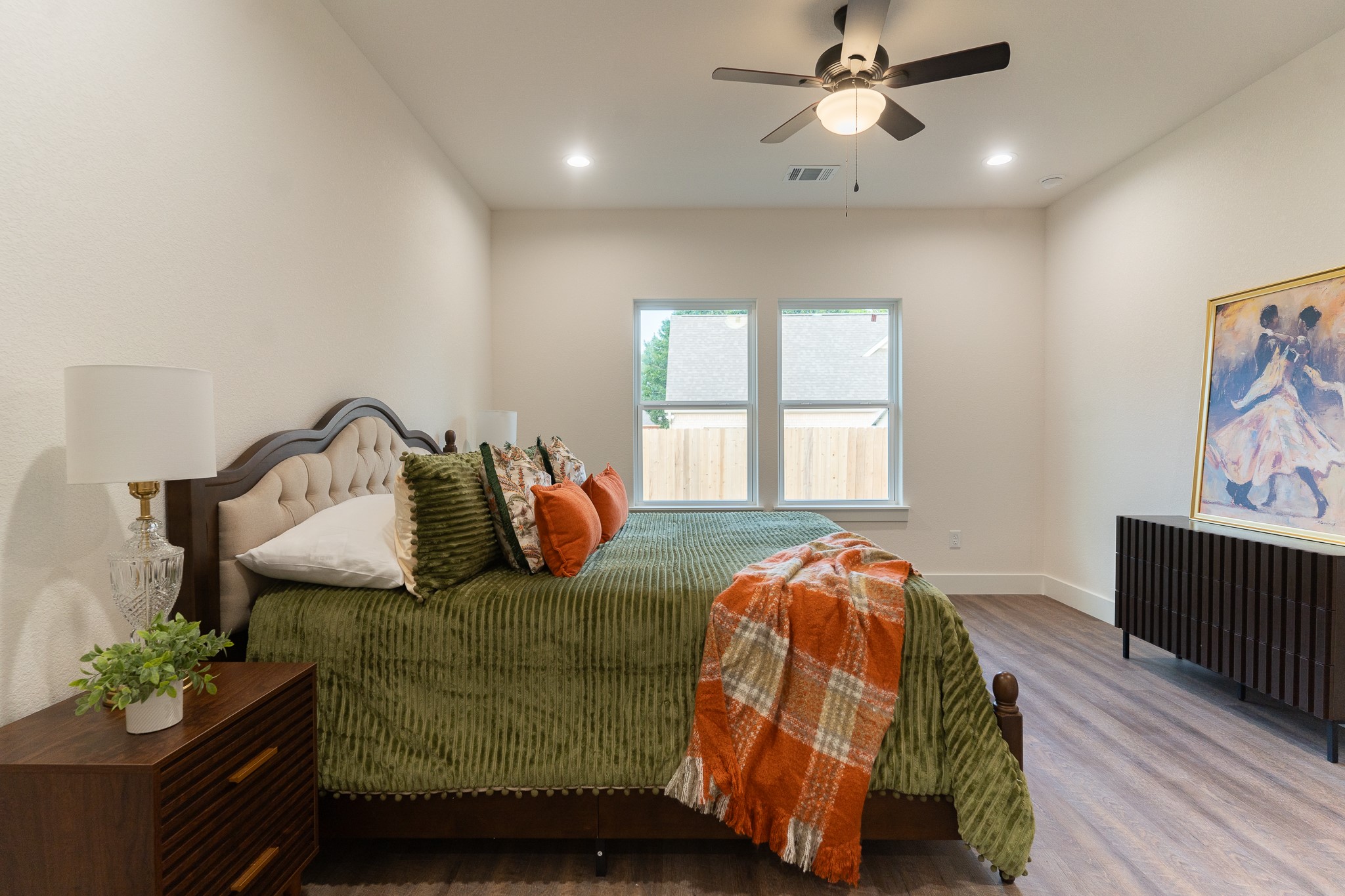 304 String Prairie Way Smithville, TX 78957 - Photo 16 of 30 Bedroom with wood finished floors, baseboards, recessed lighting, and a ceiling fan