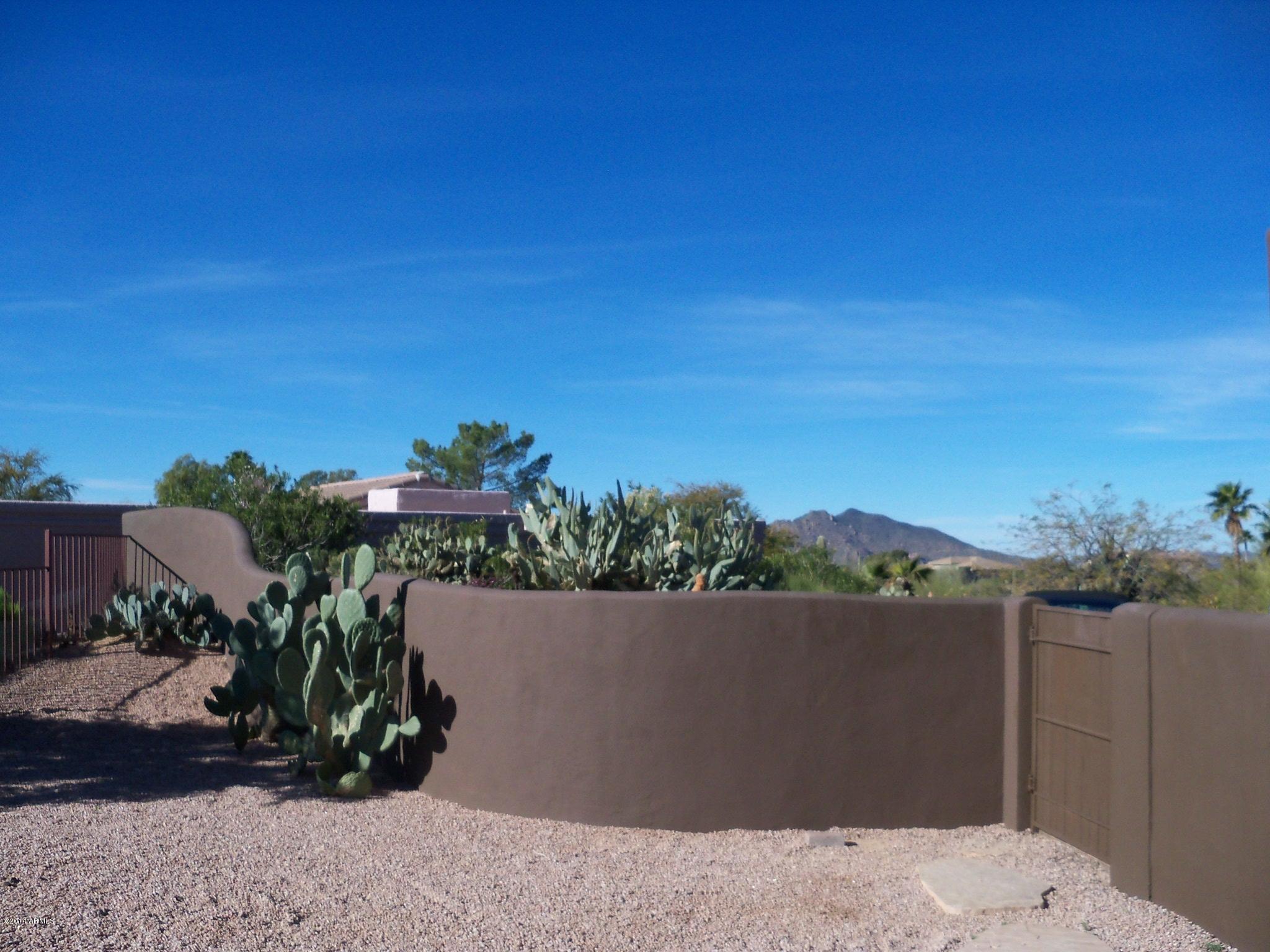 36619 Wild Flower Road Carefree, AZ 85377 - Photo 21 of 25 Privacy Wall and Garage access