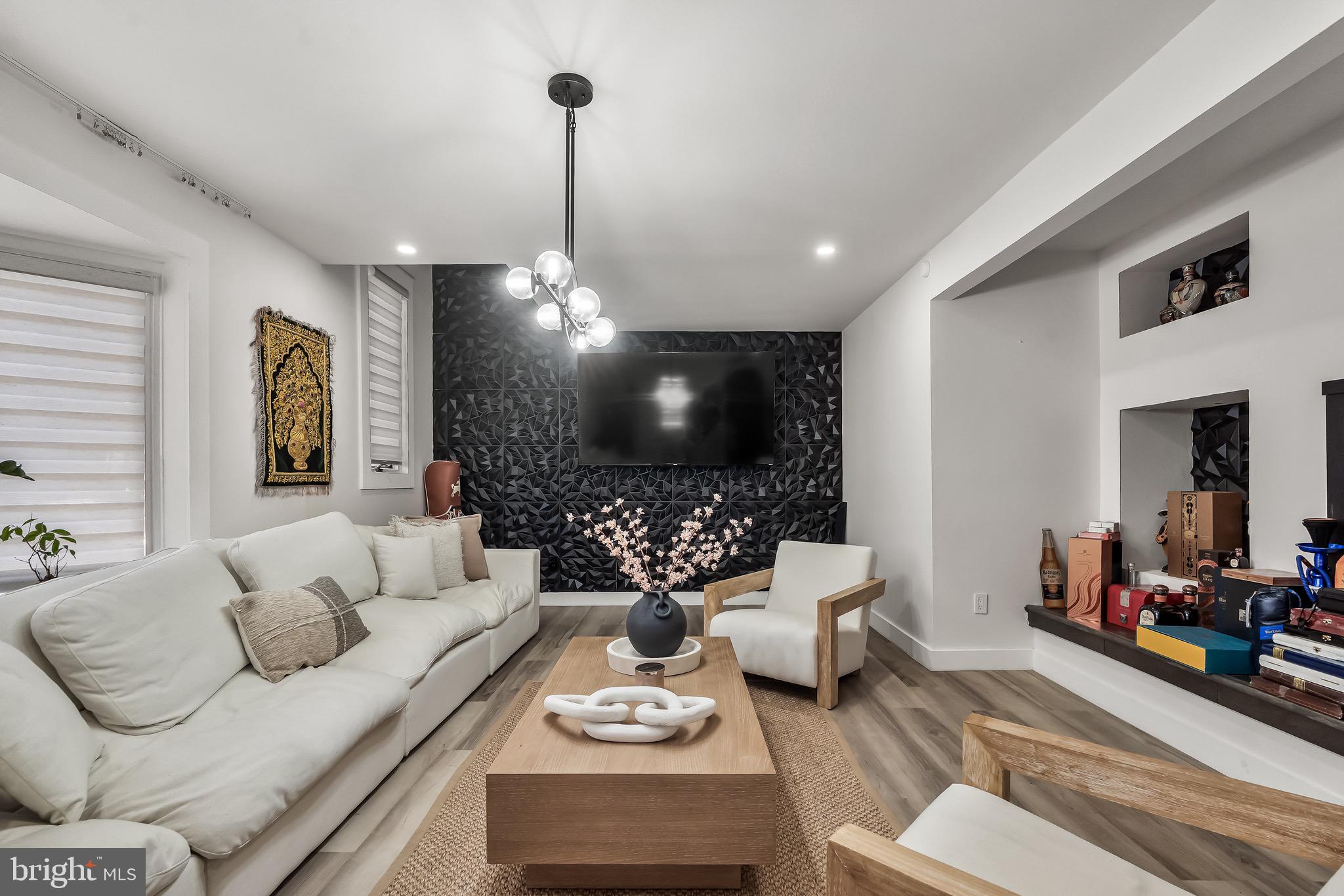3300 Springfield Avenue Pennsauken, NJ 08109 - Photo 17 of 56 a living room with furniture and a chandelier