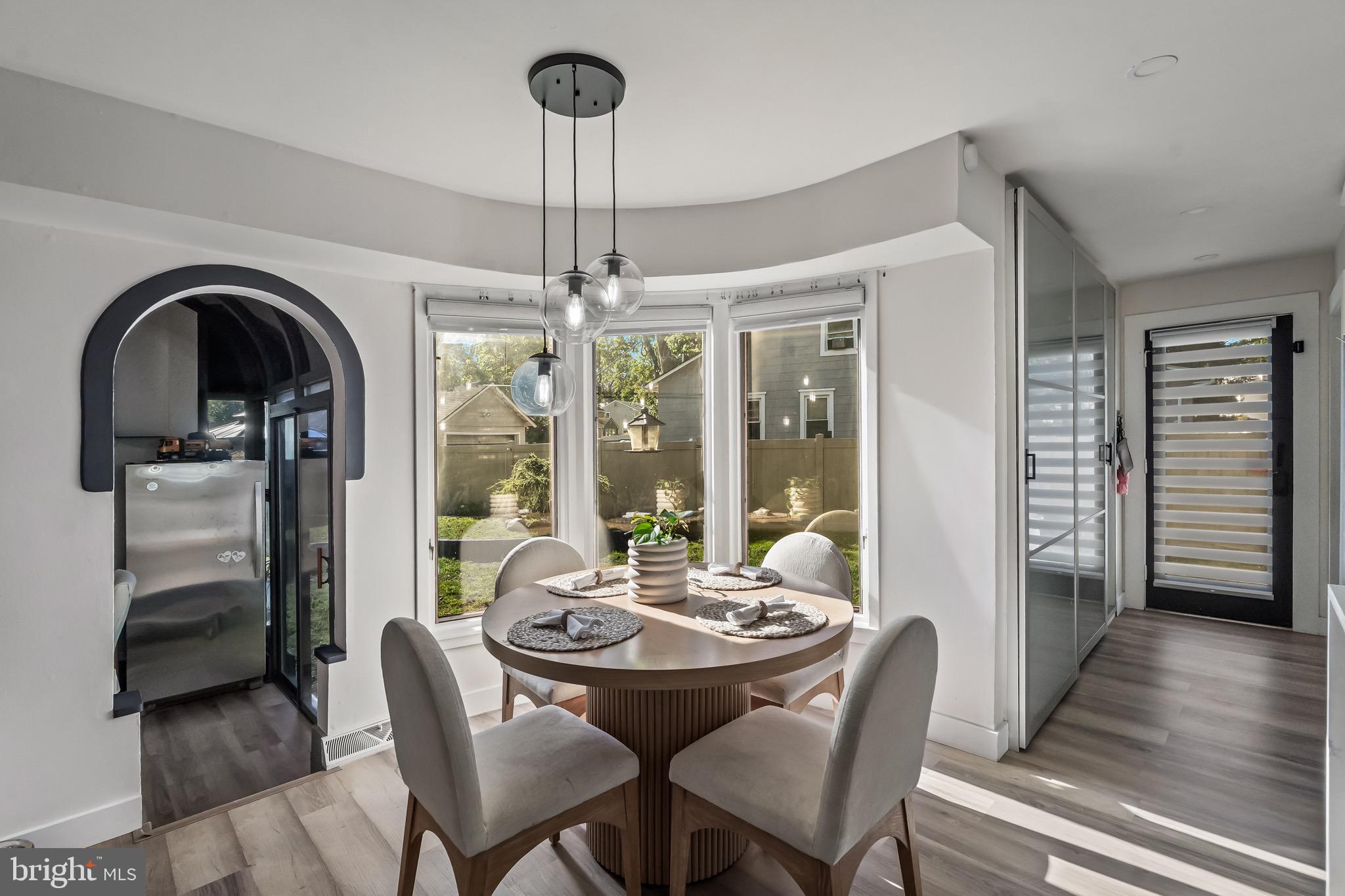 3300 Springfield Avenue Pennsauken, NJ 08109 - Photo 8 of 56 a view of a dining room with furniture window and wooden floor