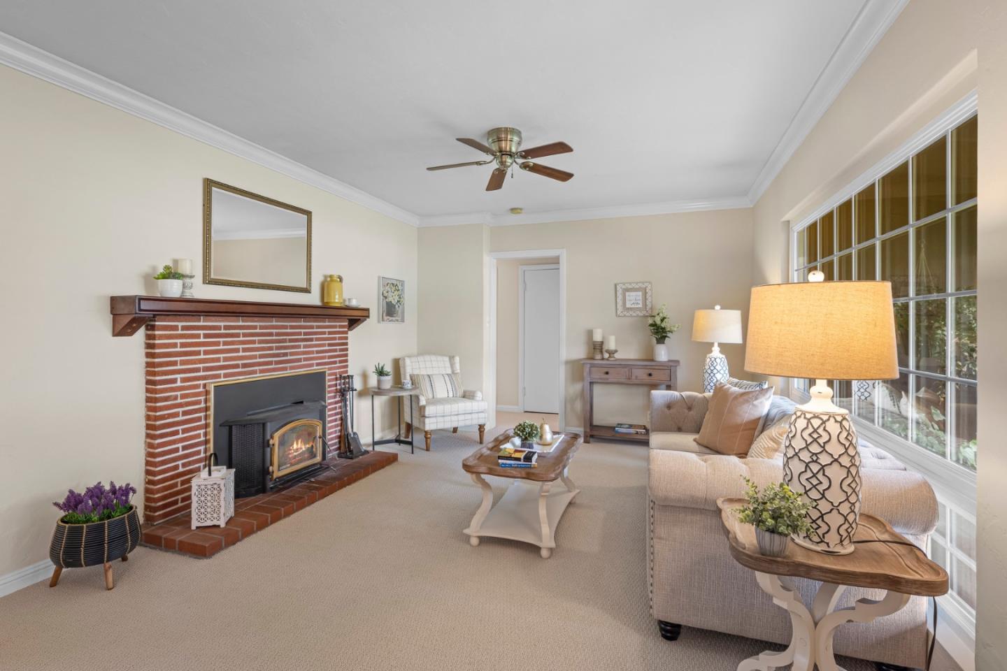 13755 Columbet Avenue San Martin, CA 95046 - Photo 11 of 61 a living room with furniture a fireplace and a window