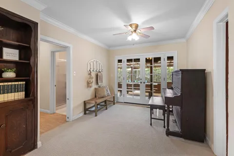 a view of a dining room with furniture and a livingroom