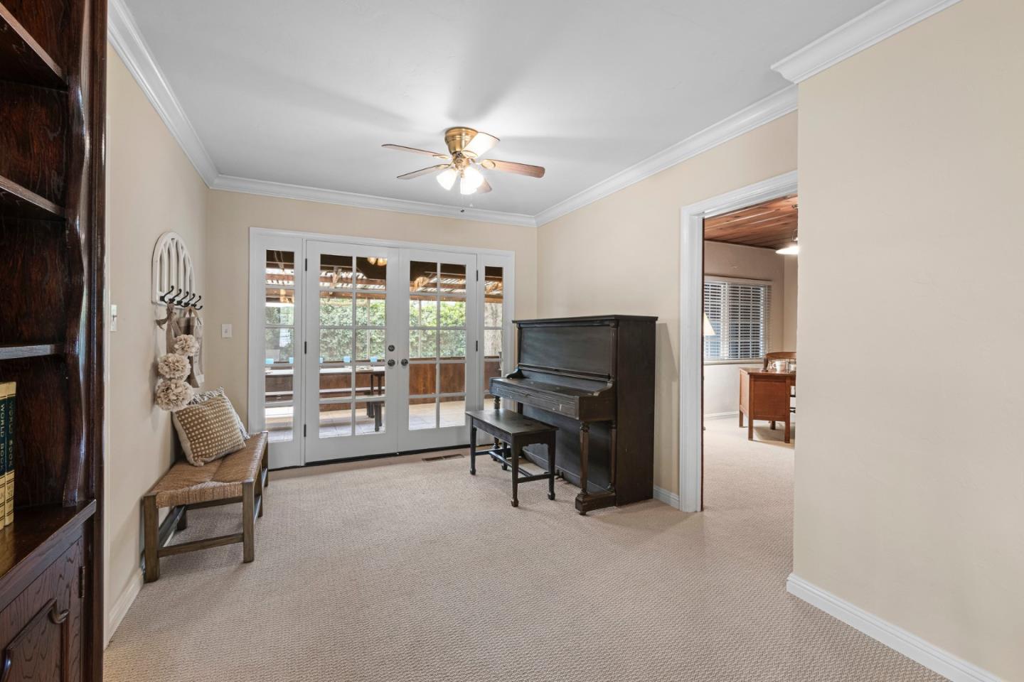 13755 Columbet Avenue San Martin, CA 95046 - Photo 13 of 61 a living room with furniture and a flat screen tv