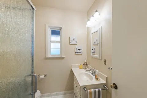 a view of yard with large trees