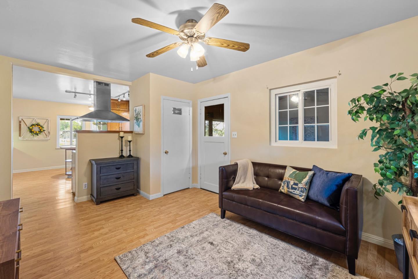 13755 Columbet Avenue San Martin, CA 95046 - Photo 33 of 61 a living room with furniture and wooden floor
