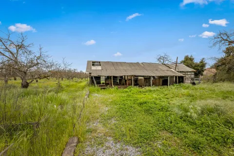 a view of a lake with a yard