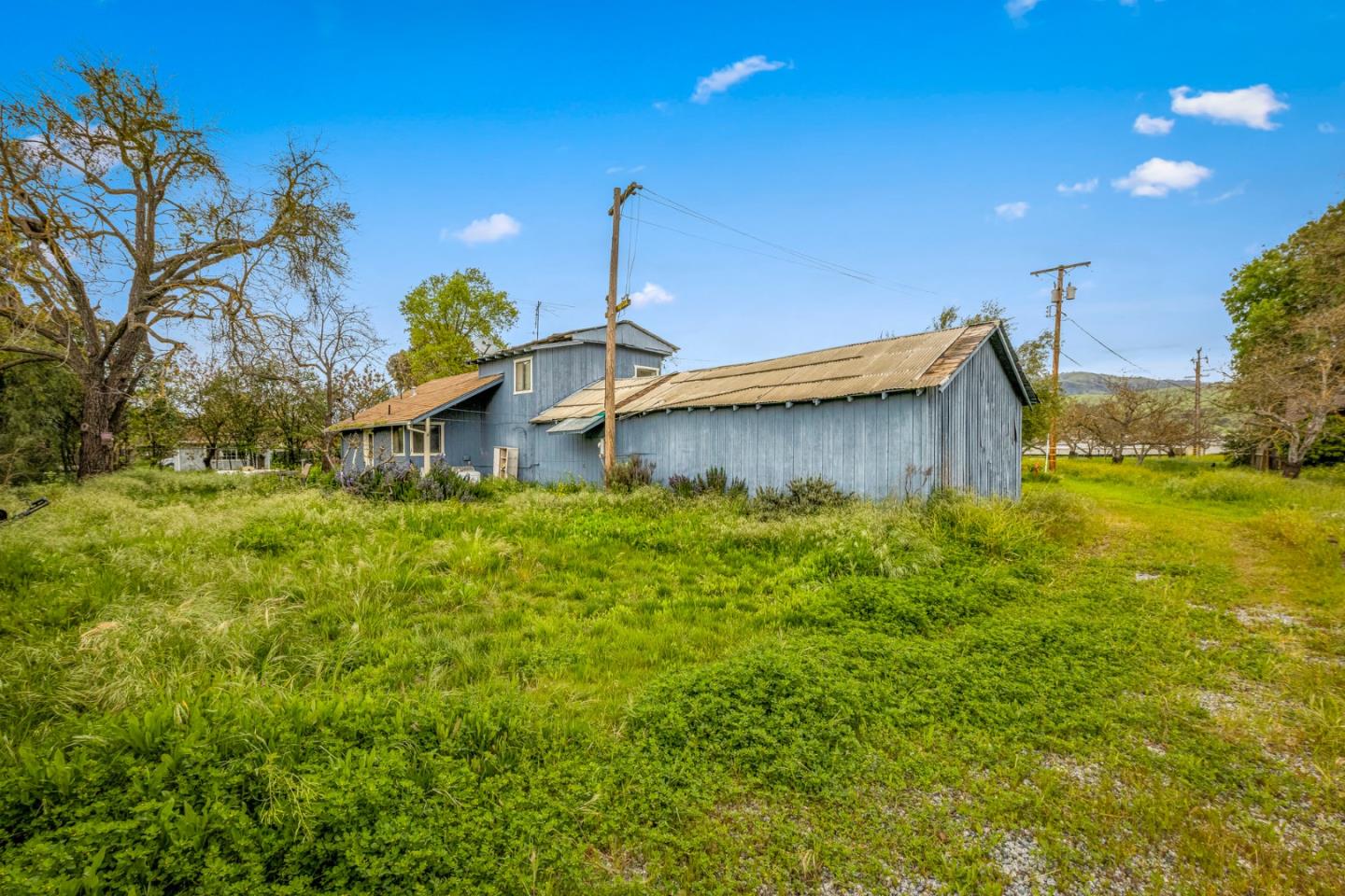 13755 Columbet Avenue San Martin, CA 95046 - Photo 44 of 61 a front view of a house with garden