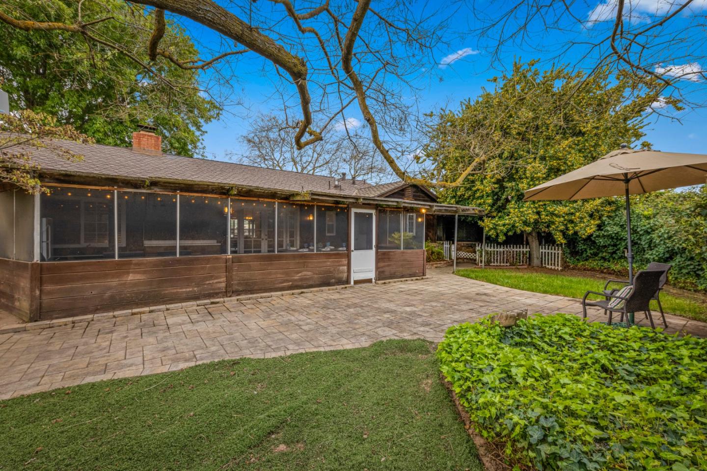 13755 Columbet Avenue San Martin, CA 95046 - Photo 50 of 61 a view of a house with a backyard