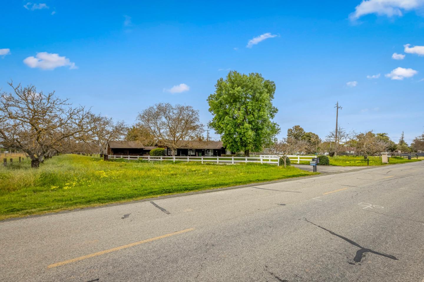 13755 Columbet Avenue San Martin, CA 95046 - Photo 59 of 61 a view of a golf course with a road