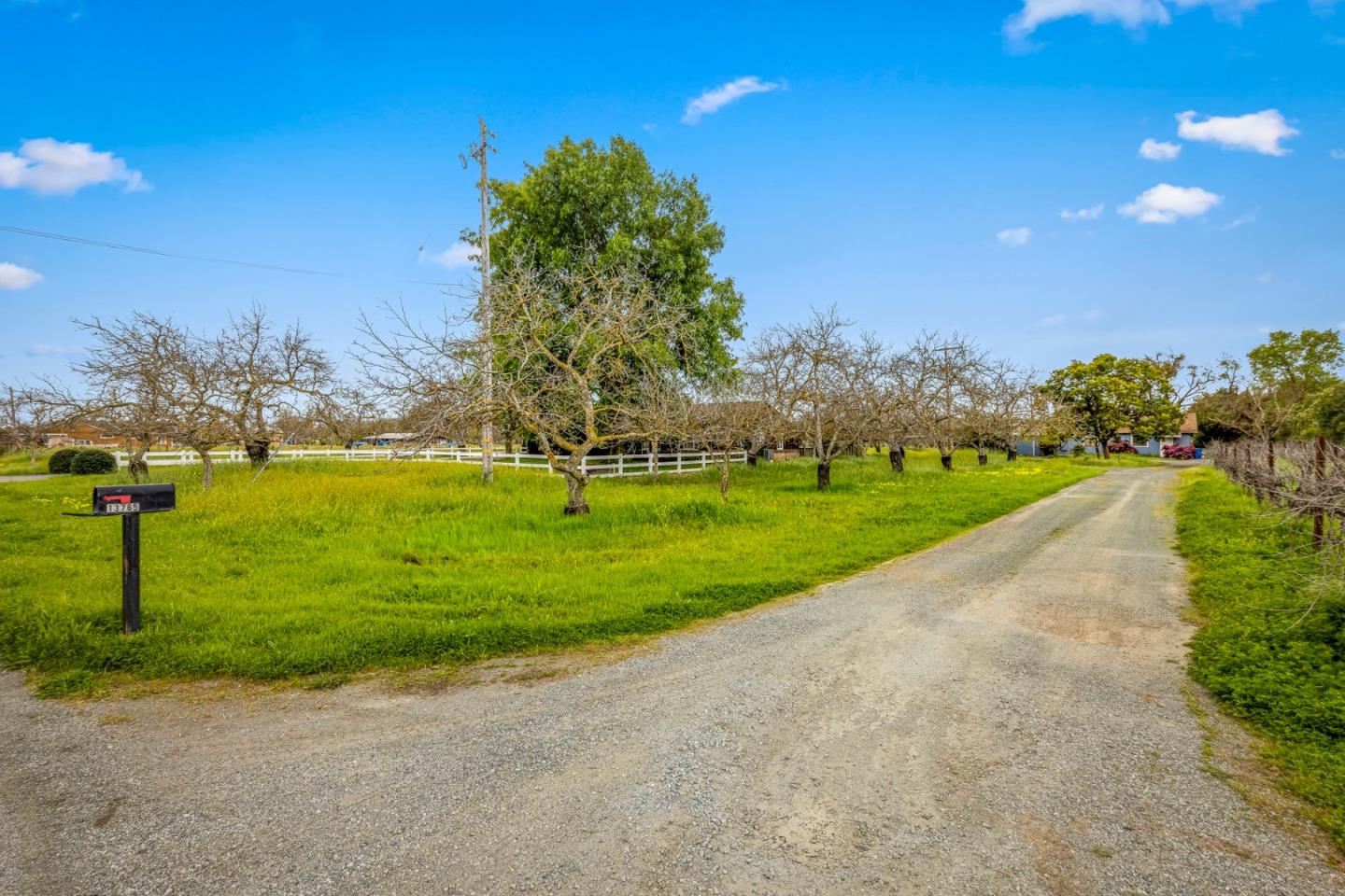 13755 Columbet Avenue San Martin, CA 95046 - Photo 61 of 61 a view of a golf course with a lake view