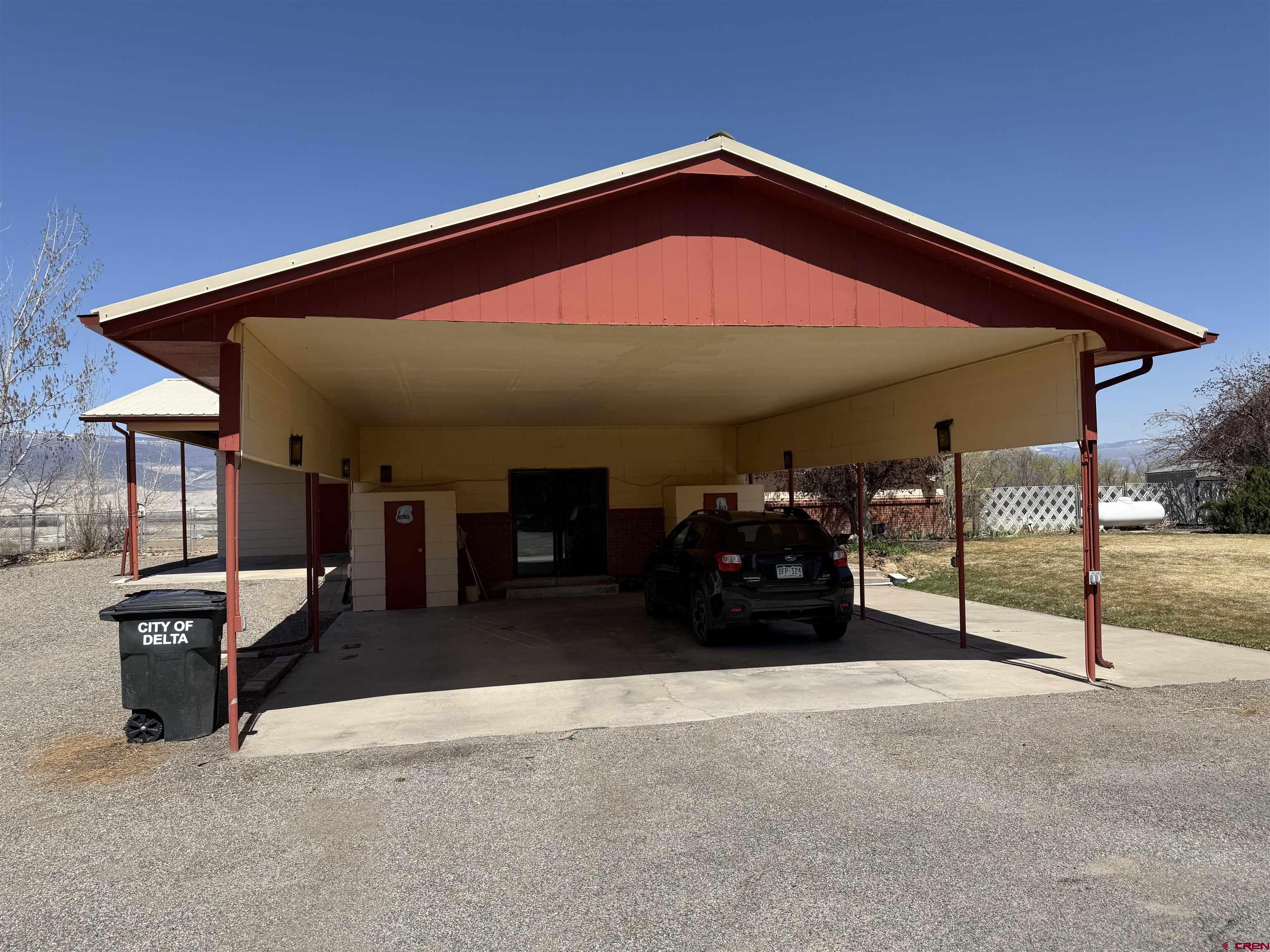 1793 Roundup Road Delta, CO 81416 - Photo 3 of 41 a view of a car park in front of house
