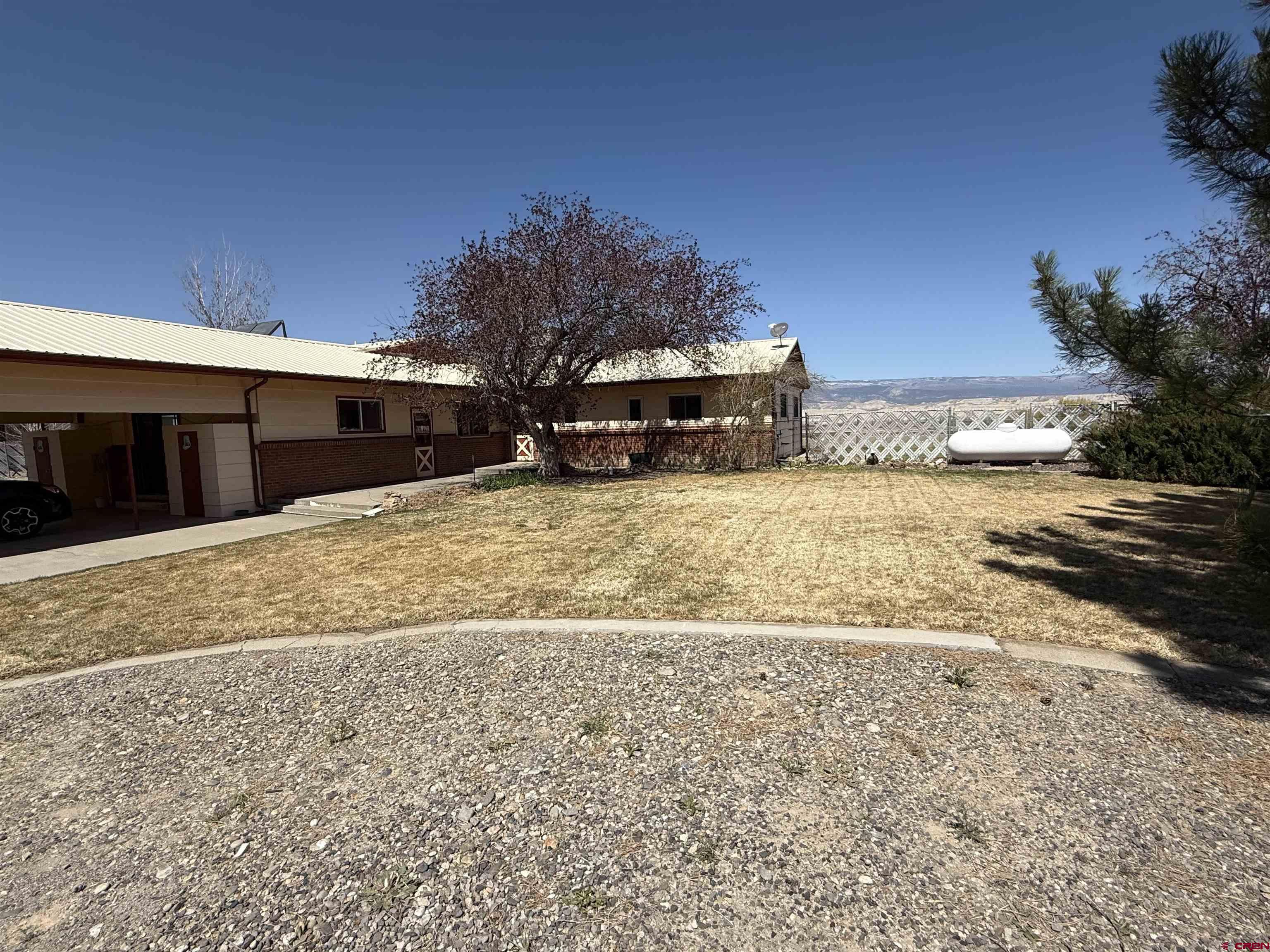 1793 Roundup Road Delta, CO 81416 - Photo 4 of 41 a view of a house with a yard