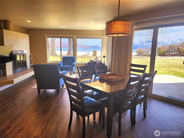 a dining room with furniture window wooden floor