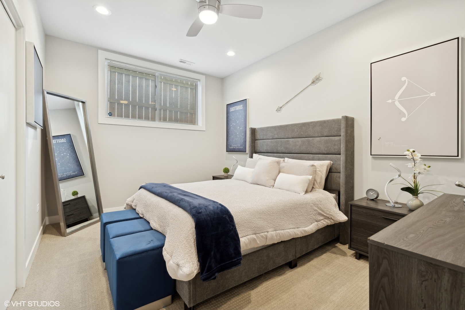 1449 East 65th Place, Unit 1 Chicago, IL 60637 - Photo 18 of 18 a bedroom with a bed and a mirror