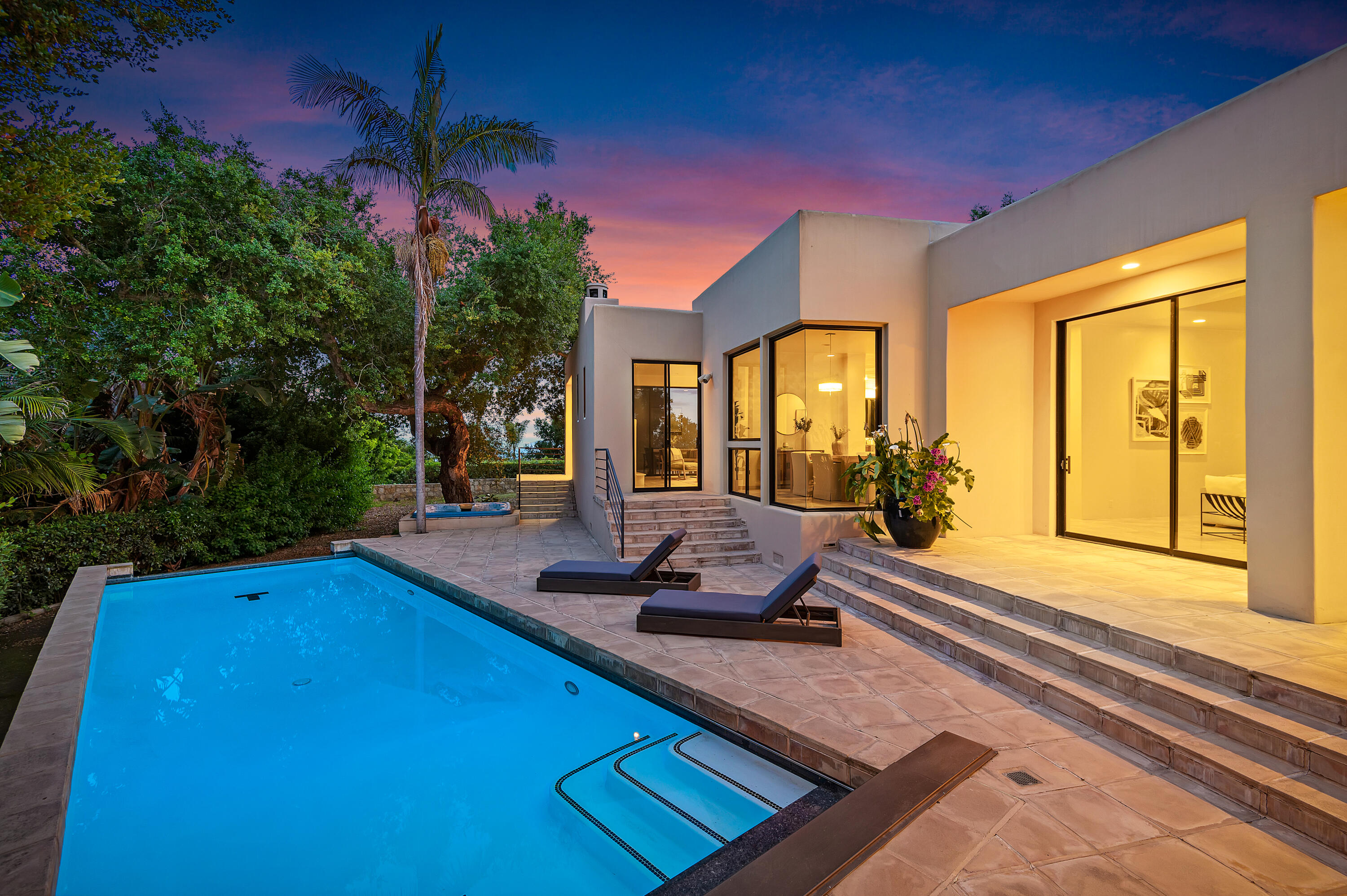 a view of swimming pool with outdoor seating