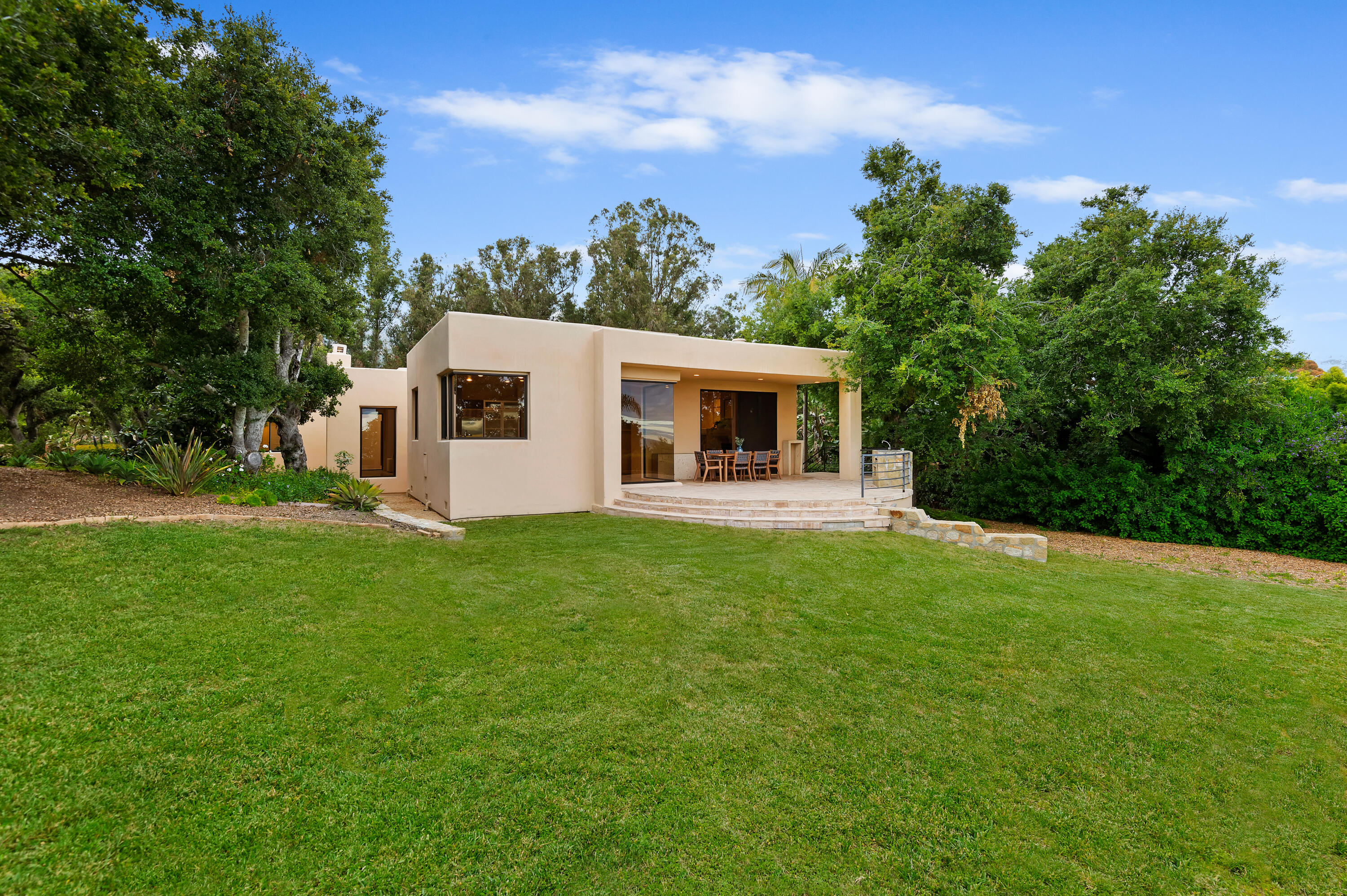 1181 Glenview Road Santa Barbara, CA 93108 - Photo 17 of 46 a front view of a house with a yard
