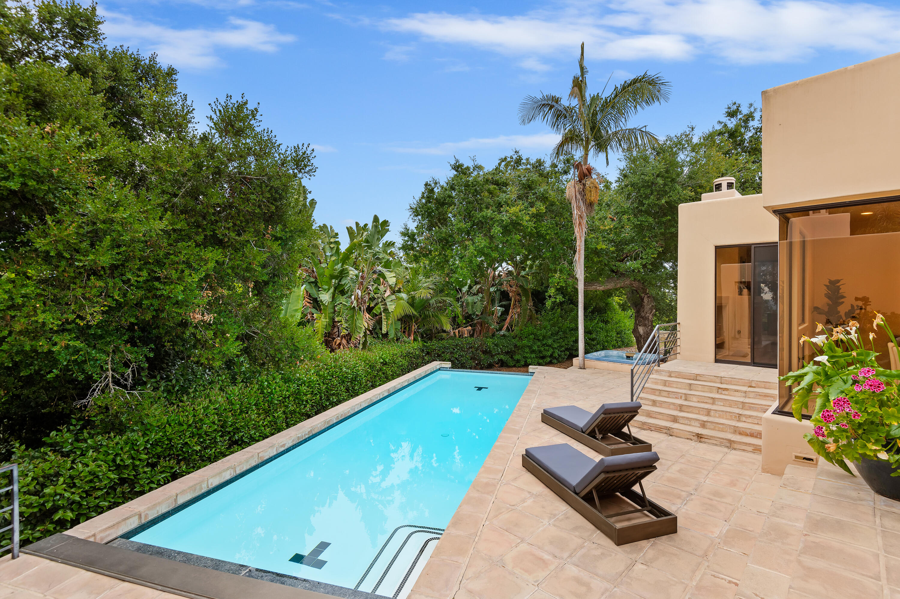 1181 Glenview Road Santa Barbara, CA 93108 - Photo 20 of 46 a view of a swimming pool with a lounge chair and grass