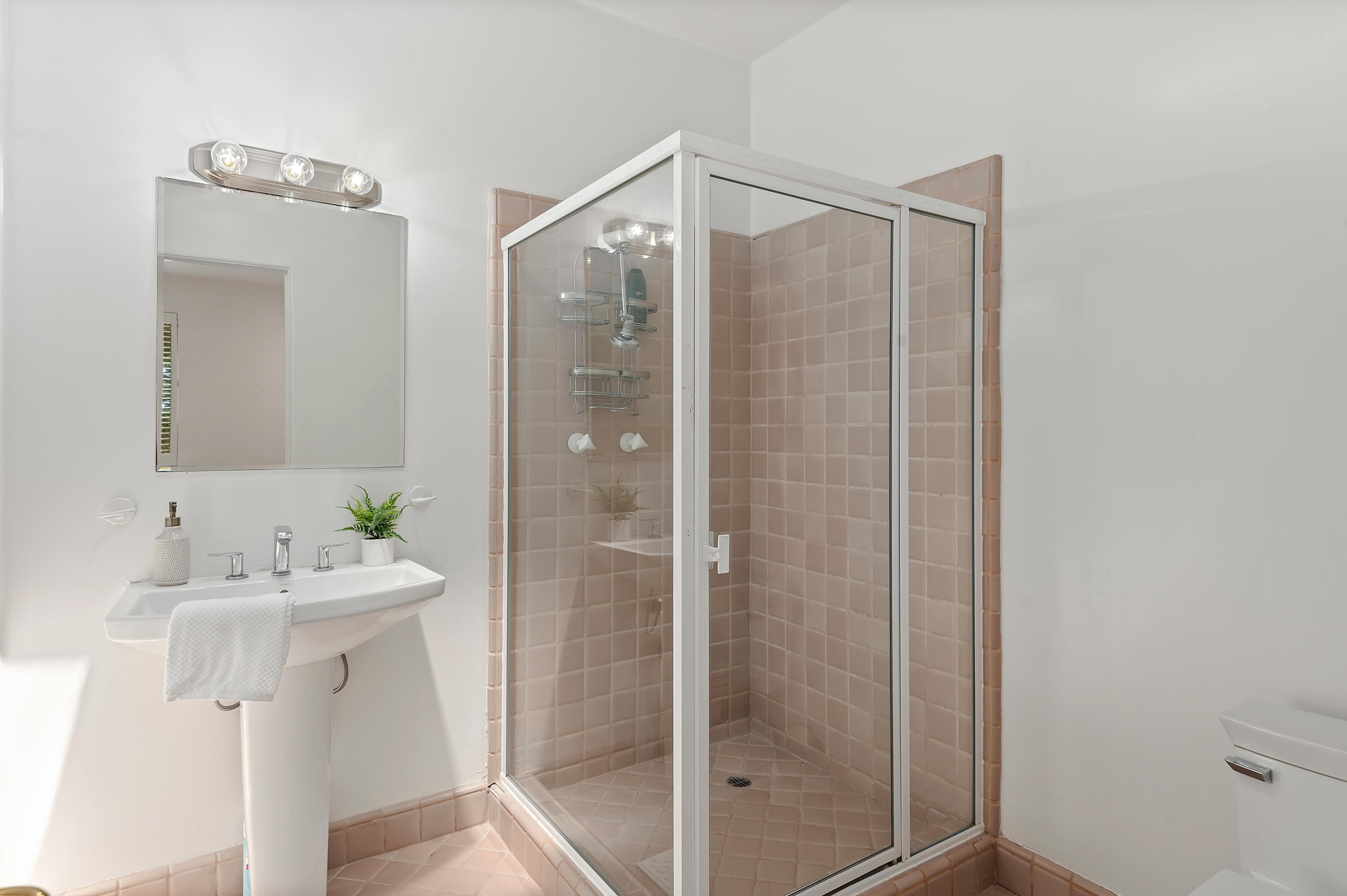 1181 Glenview Road Santa Barbara, CA 93108 - Photo 28 of 46 a bathroom with a sink mirror and shower