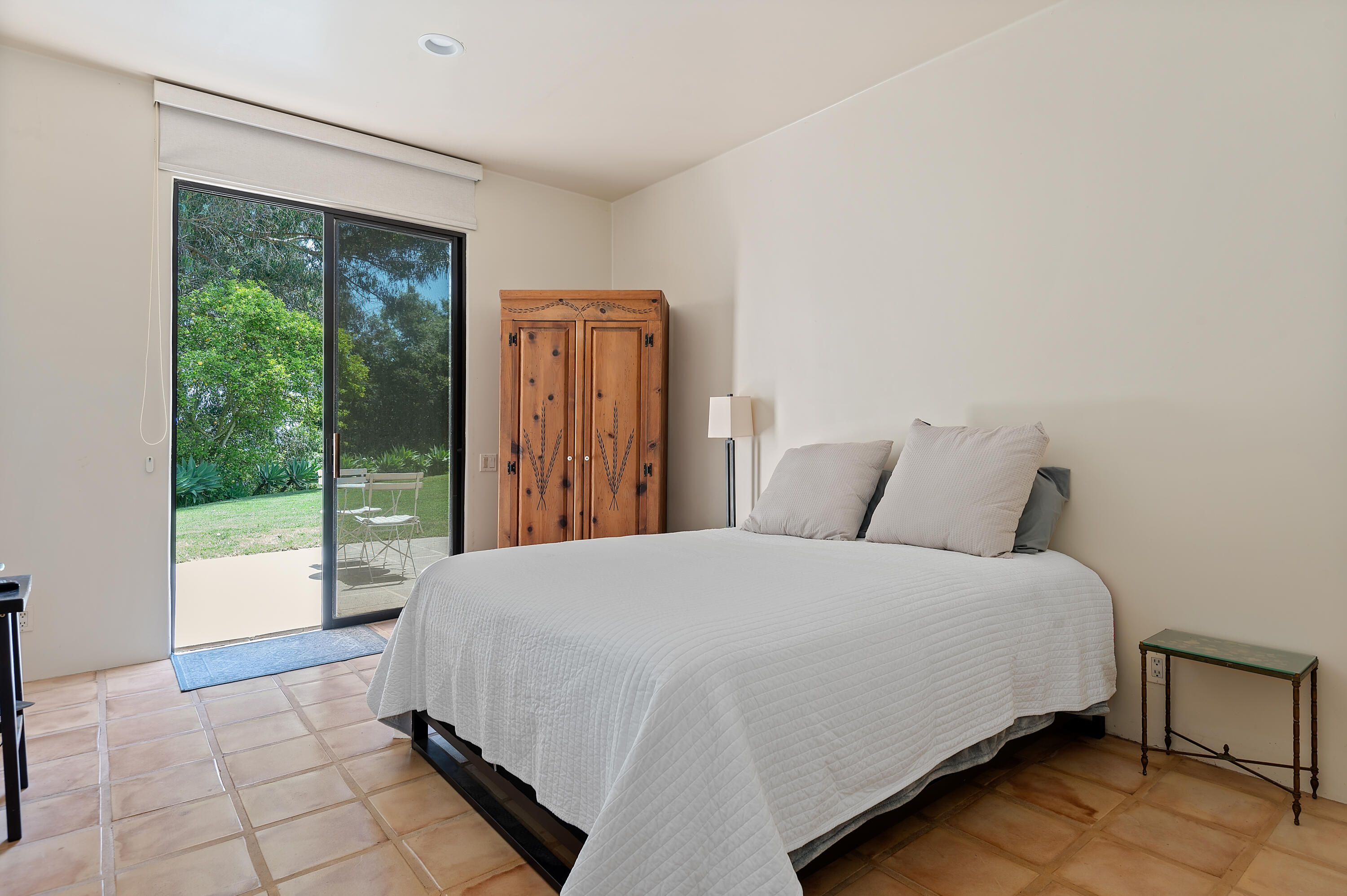 1181 Glenview Road Santa Barbara, CA 93108 - Photo 35 of 46 a large bed sitting in a bedroom next to a window