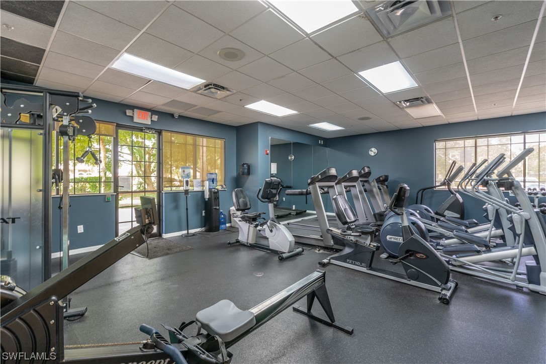 21660 Windham Run Estero, FL 33928 - Photo 30 of 32 a room with gym equipment