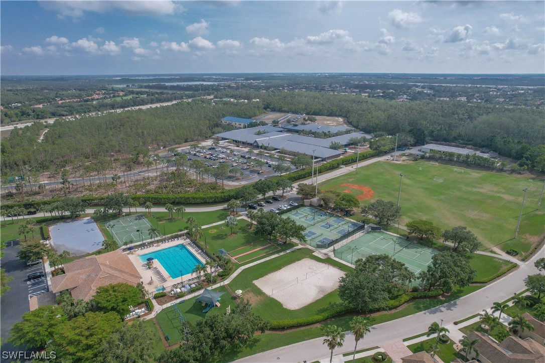 21660 Windham Run Estero, FL 33928 - Photo 5 of 32 an aerial view of residential houses with outdoor space