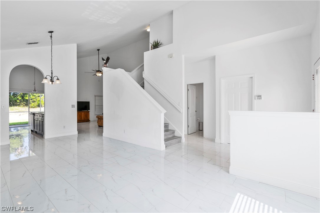 21660 Windham Run Estero, FL 33928 - Photo 9 of 32 a view of a living room with furniture and a ceiling fan