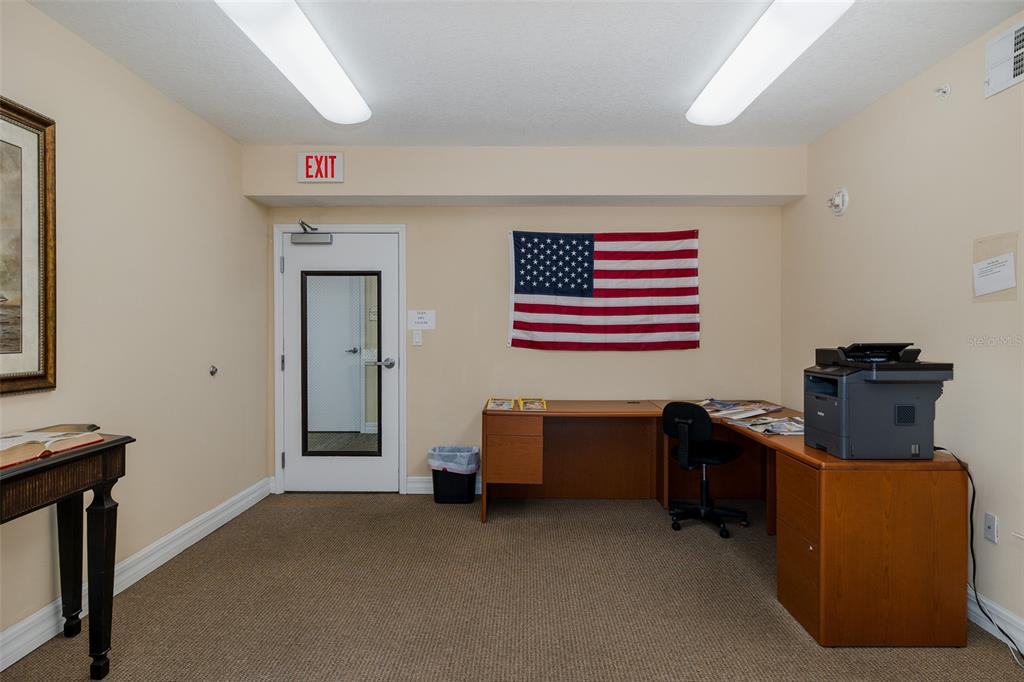 4516 Seagull Drive, Unit 411 New Port Richey, FL 34652 - Photo 39 of 47 a room with furniture and a window