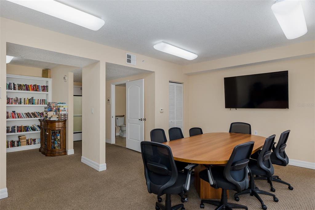 4516 Seagull Drive, Unit 411 New Port Richey, FL 34652 - Photo 41 of 47 a view of a livingroom with furniture