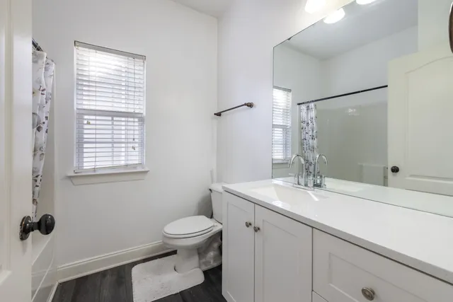 a bathroom with a shower and a bathtub