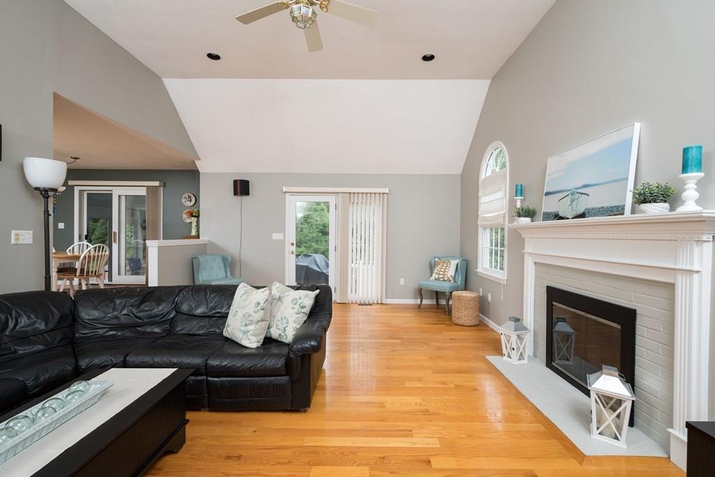 3 Tupelo Drive Hingham, MA 02043 - Photo 14 of 35 a living room with furniture and a fireplace