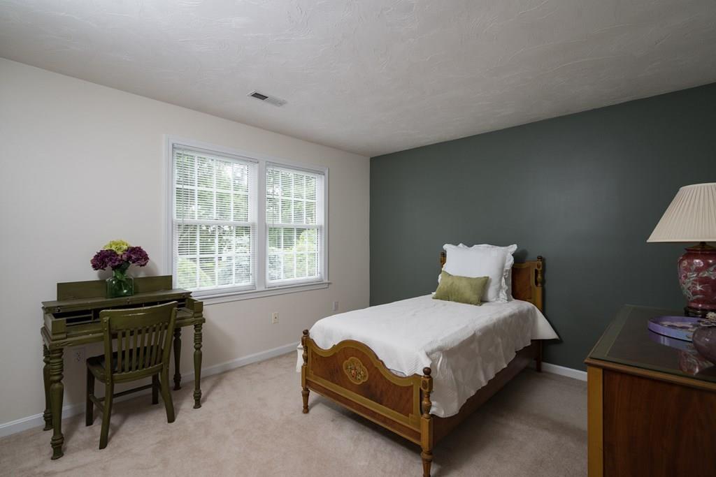 3 Tupelo Drive Hingham, MA 02043 - Photo 23 of 35 a bedroom with a bed and a window