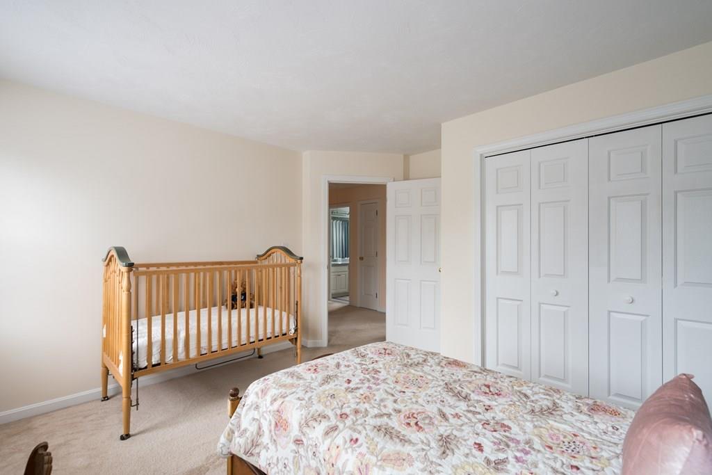 3 Tupelo Drive Hingham, MA 02043 - Photo 25 of 35 a bedroom with a bed and a window