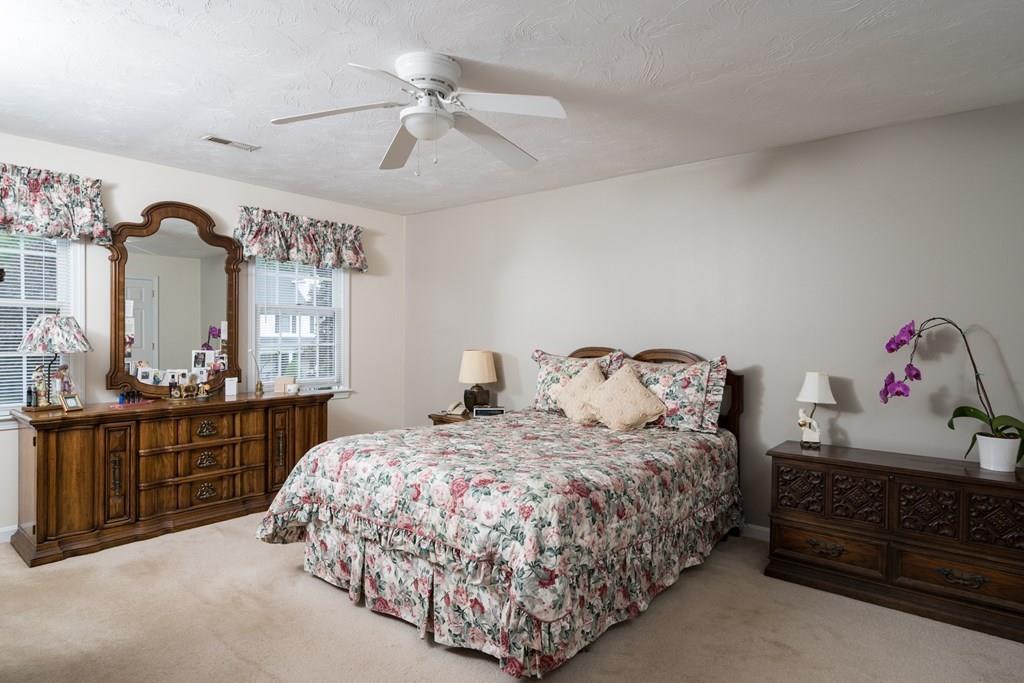 3 Tupelo Drive Hingham, MA 02043 - Photo 28 of 35 a bedroom with a bed and dresser