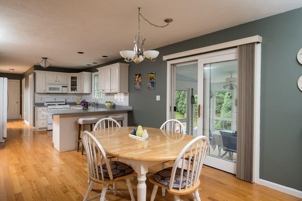 3 Tupelo Drive Hingham, MA 02043 - Photo 8 of 35 a view of a dining room with furniture window and wooden floor