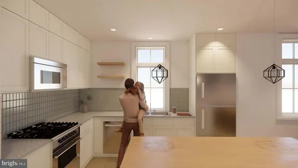 a kitchen with a refrigerator and a stove