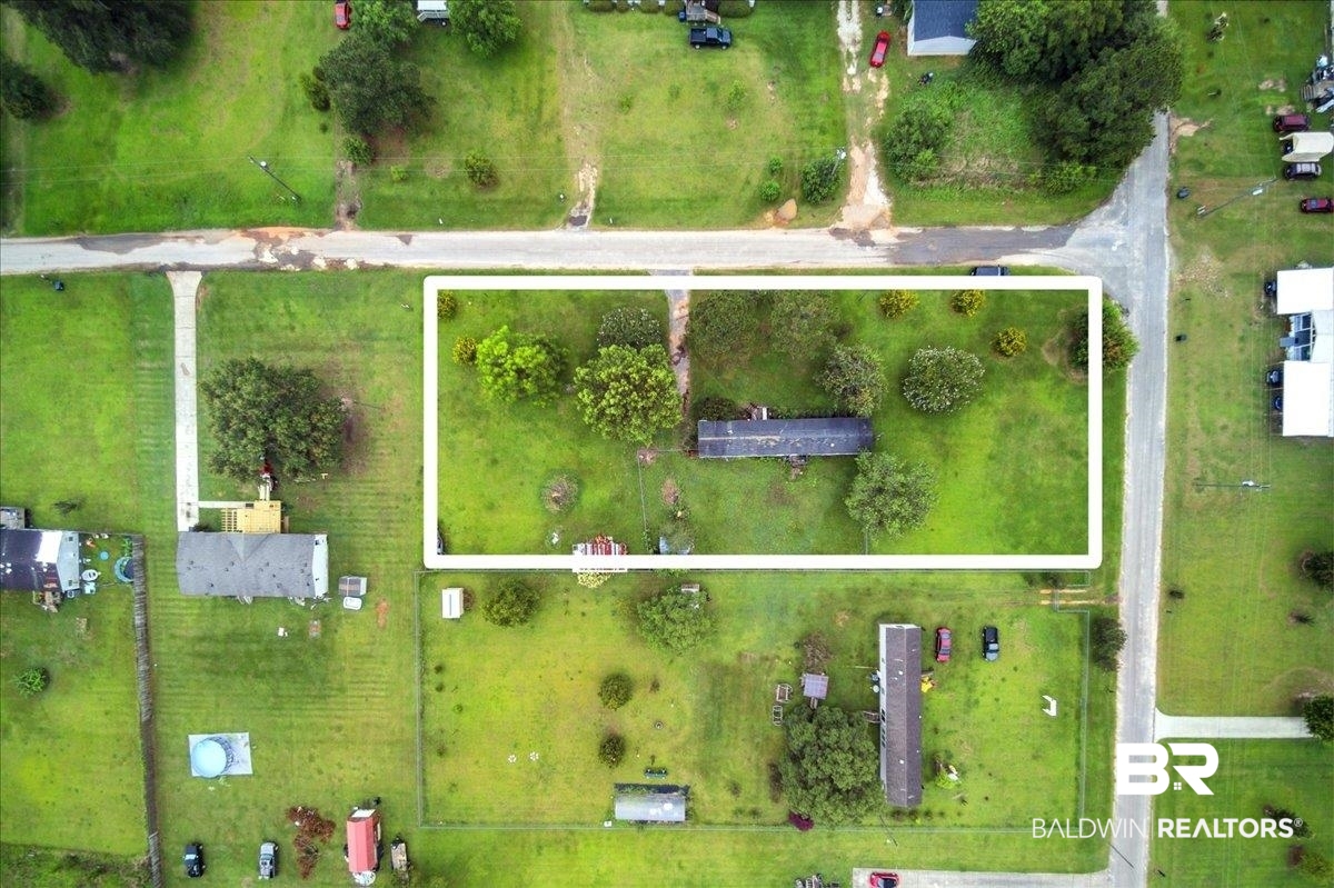 8296 Bennett Road North Grand Bay, AL 36541 - Photo 14 of 16 Aerial overview of property's location with property boundaries highlighted