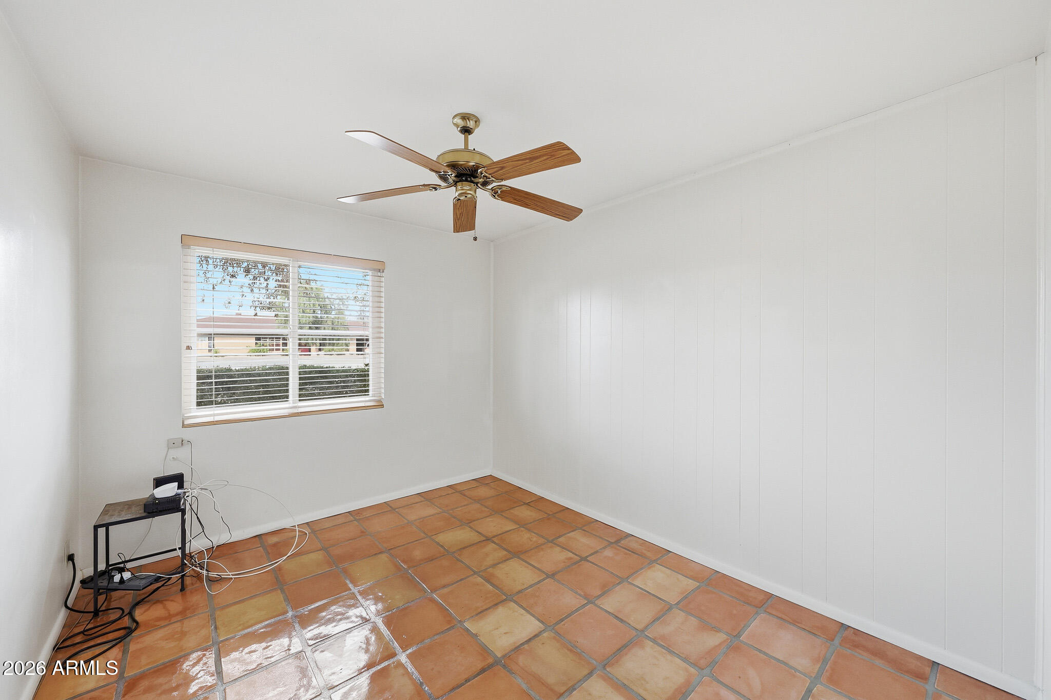 2215 West Earll Drive Phoenix, AZ 85015 - Photo 17 of 55 a view of a big room with wooden floor and windows in a room