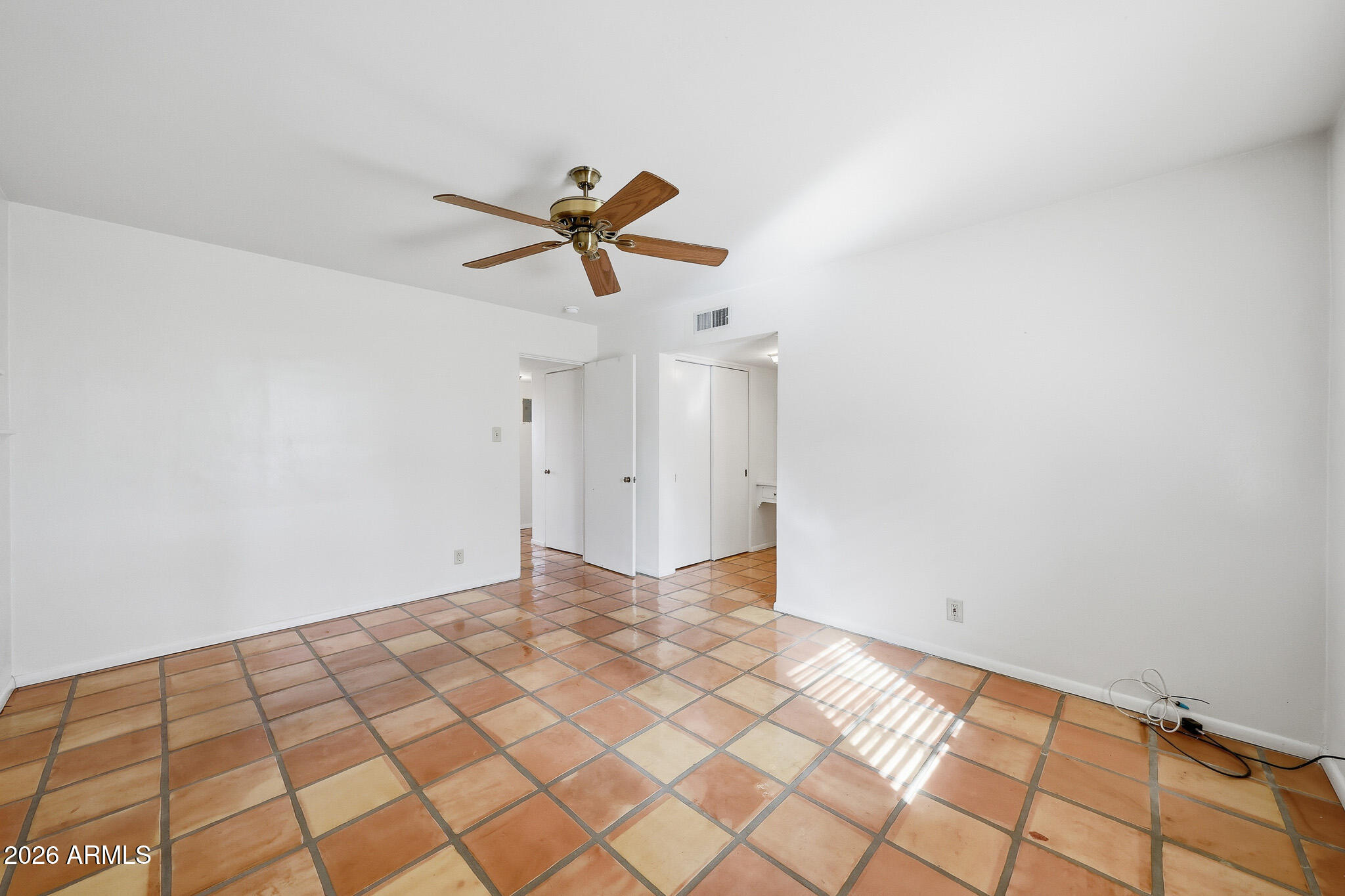 2215 West Earll Drive Phoenix, AZ 85015 - Photo 22 of 55 a view of a big room with wooden floor
